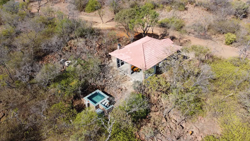 Aerial view of the Rustic Retreat cabin and plunge pool