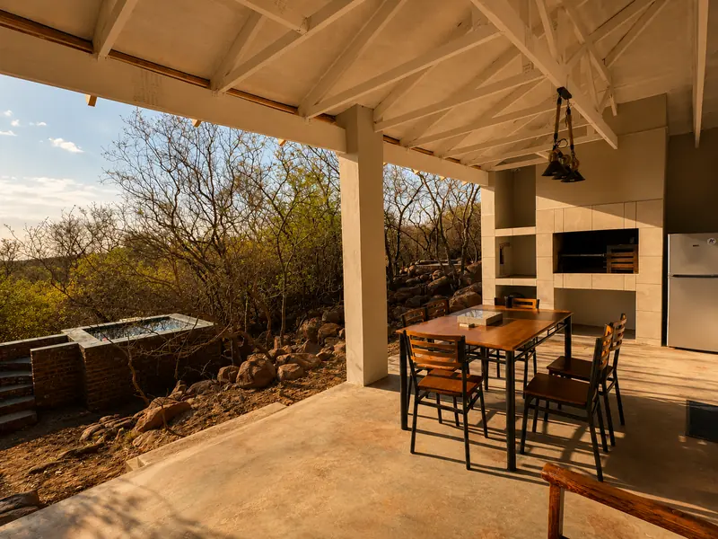 Covered patio at the bush cabin looking into the veld